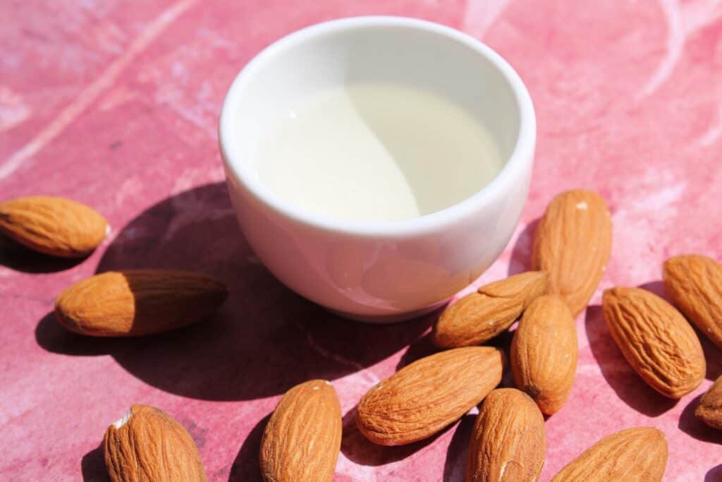 Almond hair oils for hair treatment.